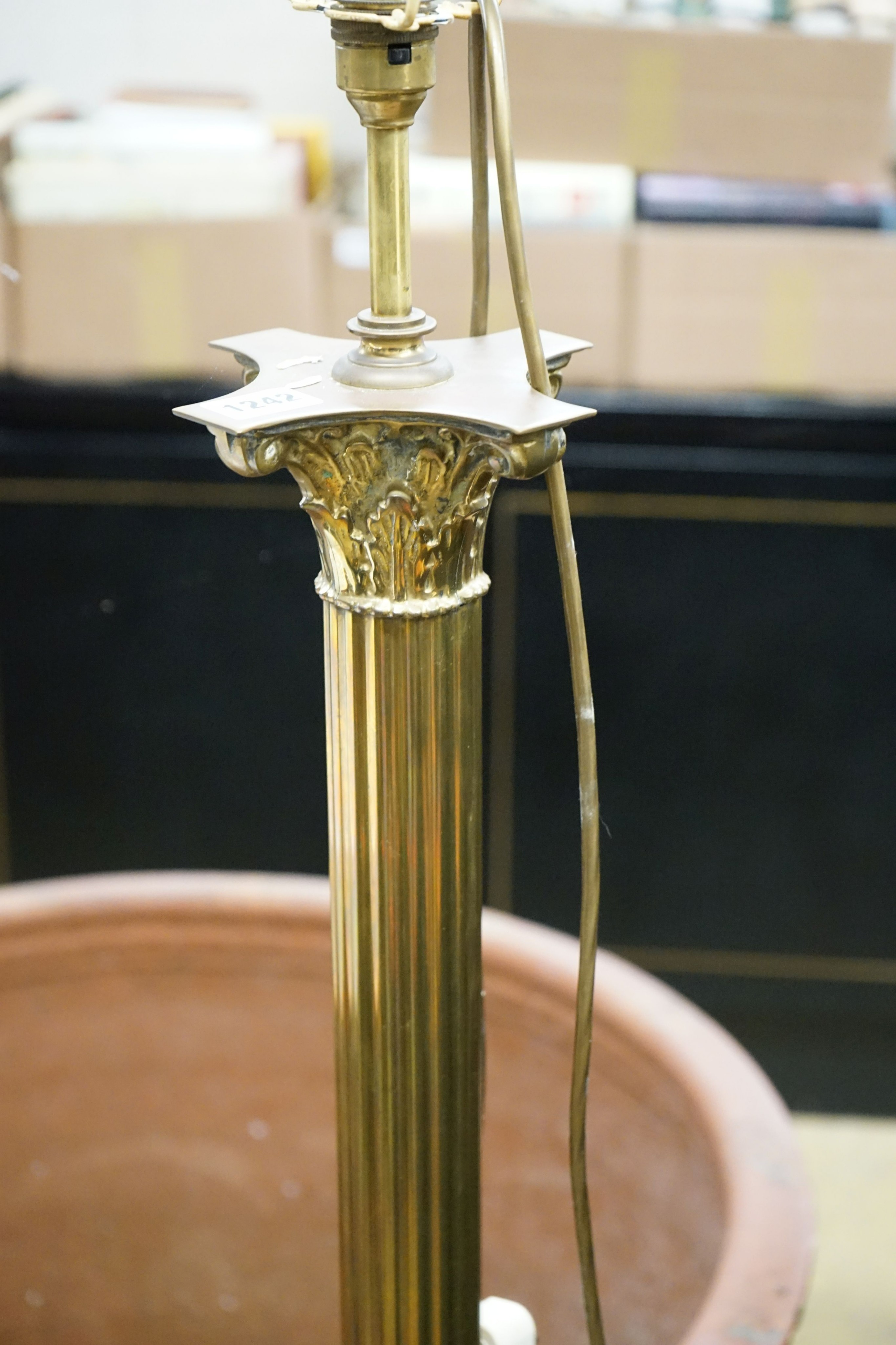 A brass Corinthian column standard lamp, height 140cm
